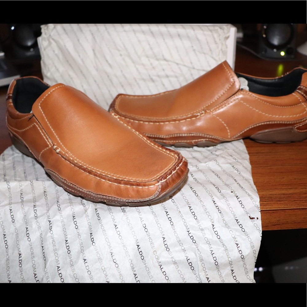 A pair of Aldo McKinzie Leather slip-ons 42D , 9US